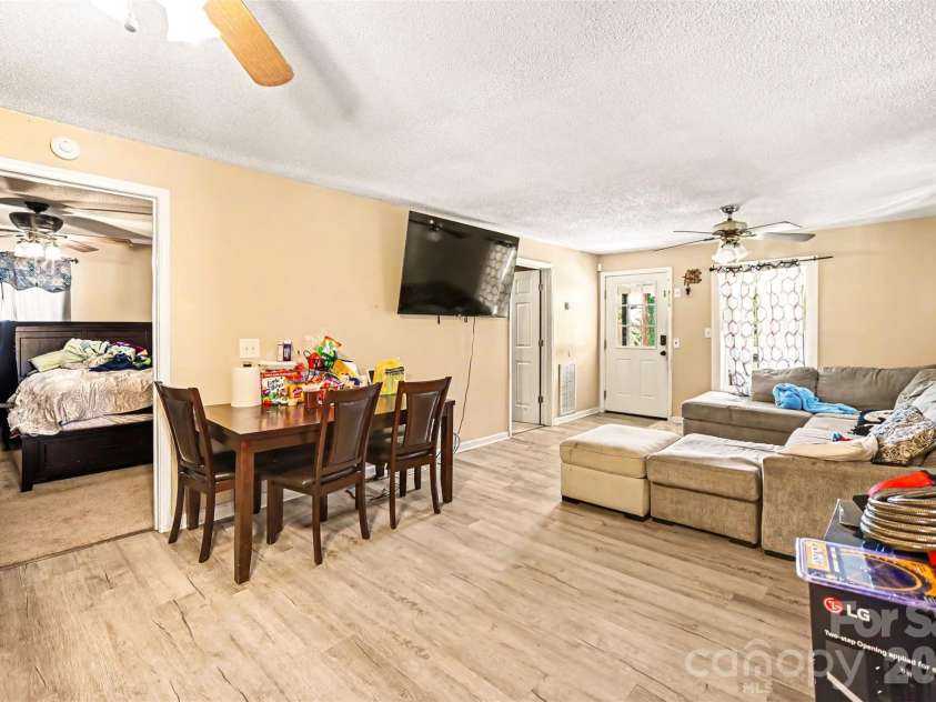 12 Bost Avenue, Concord, NC 28027.  MLS# CAR4381096, YatesRealty ID 2118. Living and dining