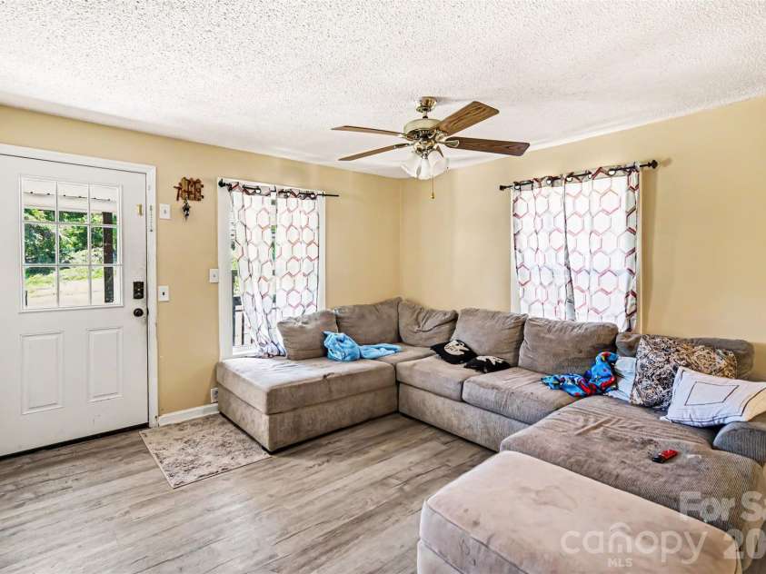 12 Bost Avenue, Concord, NC 28027.  MLS# CAR4381096, YatesRealty ID 2118. Living Room