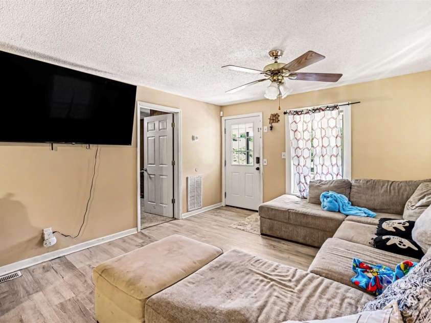 12 Bost Avenue, Concord, NC 28027.  MLS# CAR4381096, YatesRealty ID 2118. Living Room