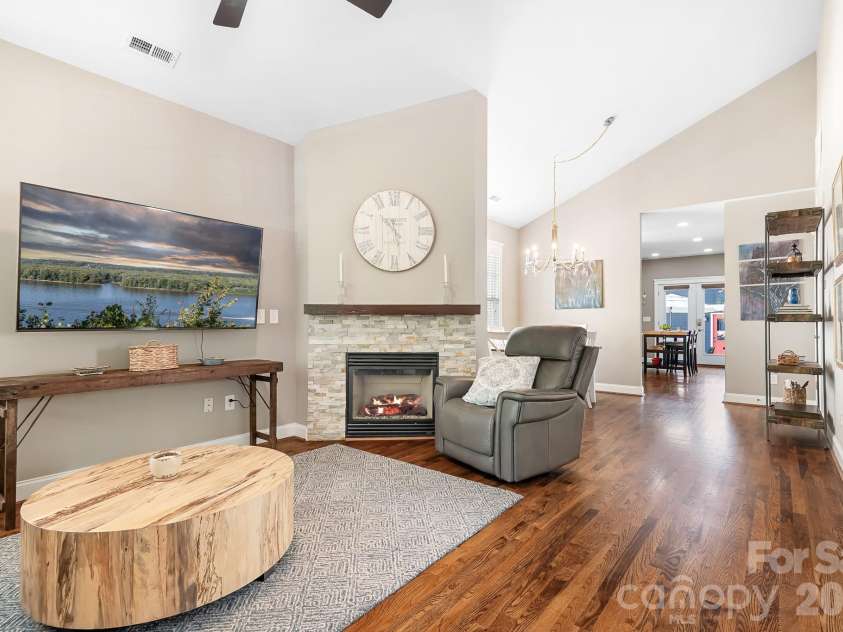 17624 Invermere Avenue, Huntersville, NC 28078.  MLS# CAR4377250, YatesRealty ID 21182. From the front door view this semi open floor plan. Notice the vaulted ceilings adding light and space to this bungalow. Hardwood floors throughout the living space.