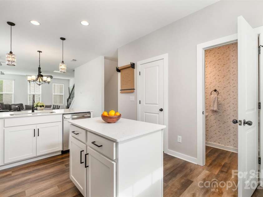 791 Seigle Point Drive, Charlotte, NC 28204.  MLS# CAR4243116, YatesRealty ID 21182. Bright & airy lighting with a convenient pantry & half bath