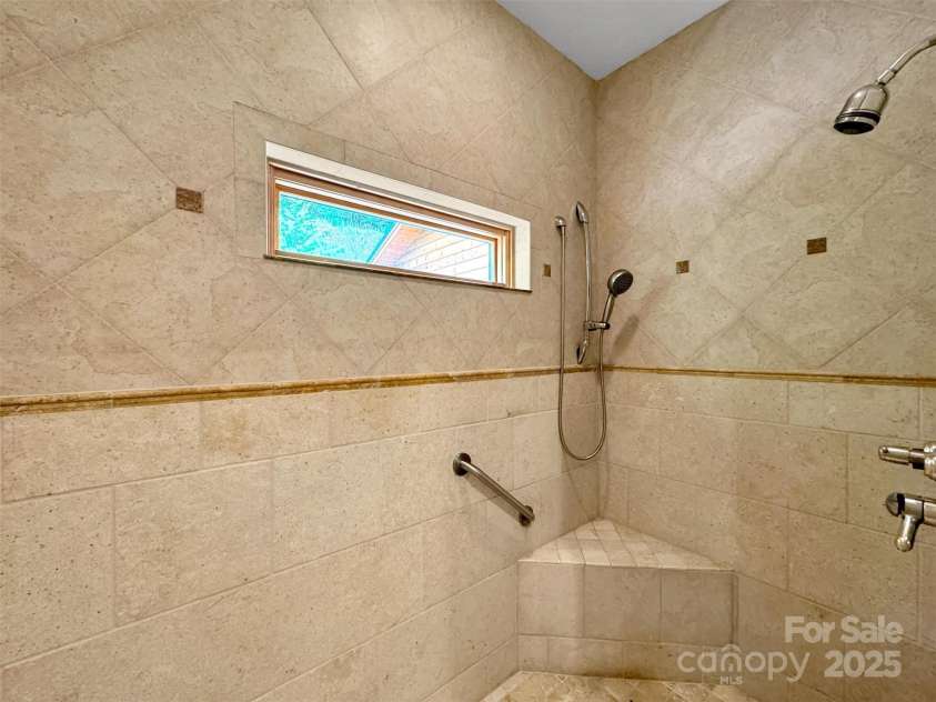 421 Ramp Patch Lane, Waynesville, NC 28786.  MLS# CAR4257466, YatesRealty ID 21184. Large Walk-In Shower