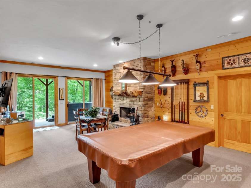 421 Ramp Patch Lane, Waynesville, NC 28786.  MLS# CAR4257466, YatesRealty ID 21184. Lower Level Family Room