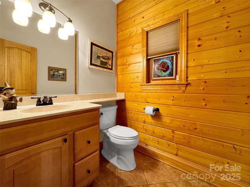 421 Ramp Patch Lane, Waynesville, NC 28786.  MLS# CAR4257466, YatesRealty ID 21184. Powder Room in Hall