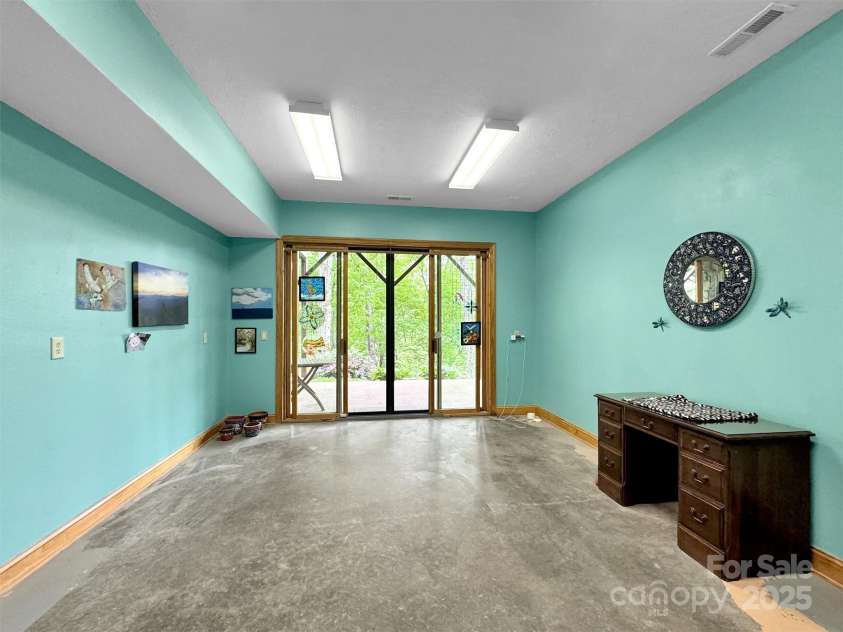 421 Ramp Patch Lane, Waynesville, NC 28786.  MLS# CAR4257466, YatesRealty ID 21184. Studio/Bonus Room