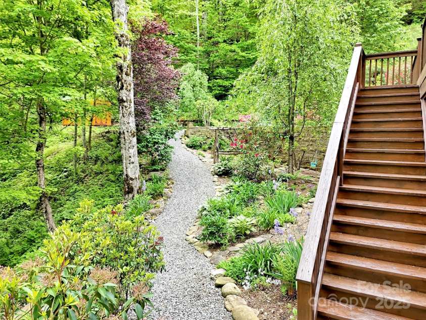 421 Ramp Patch Lane, Waynesville, NC 28786.  MLS# CAR4257466, YatesRealty ID 21184. Surrounded by Beautiful Gardens