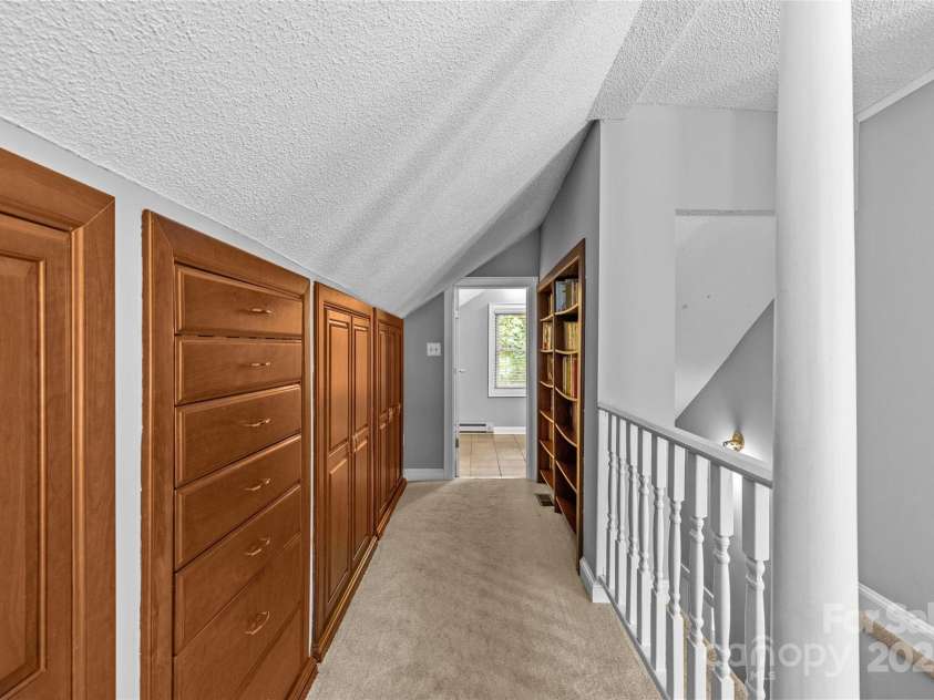 2005 Scott Avenue, Charlotte, NC 28203.  MLS# CAR4270087, YatesRealty ID 21186. Primary bedroom hallway closets