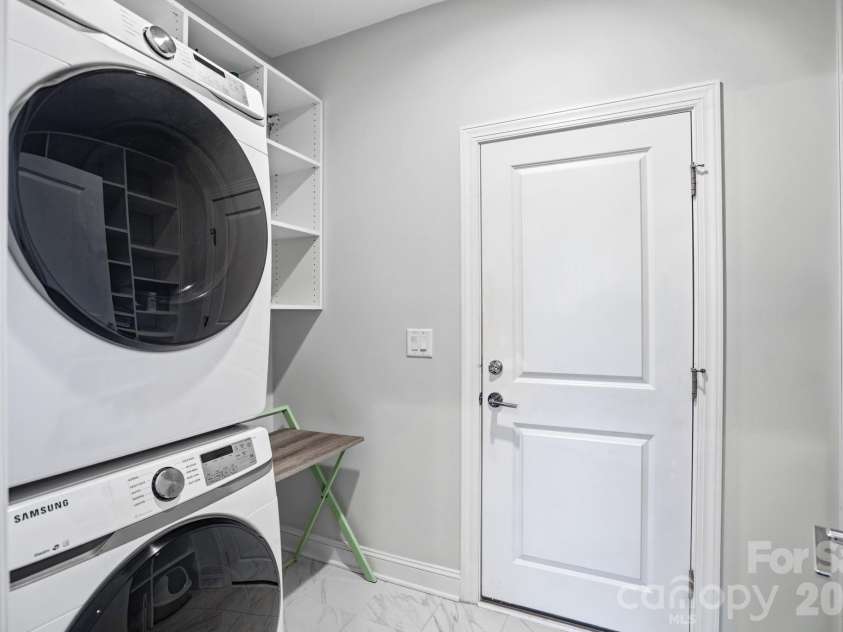 4899 Looking Glass Trail, Denver, NC 28037.  MLS# CAR4341115, YatesRealty ID 21188. Laundry with custom shelving
