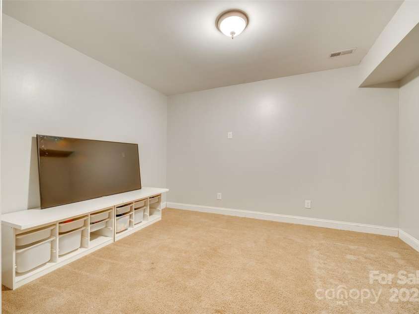 1813 Robbins Meadows Drive, Waxhaw, NC 28173.  MLS# CAR4242348, YatesRealty ID 21189. Basement Flex Room