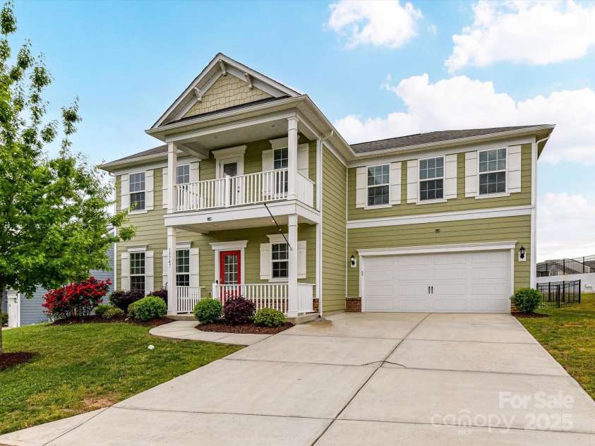 15747 Reynolds Drive, Indian Land, SC 29707.  MLS# CAR4246488, YatesRealty ID 21190. Double Rocking Chair Front porch