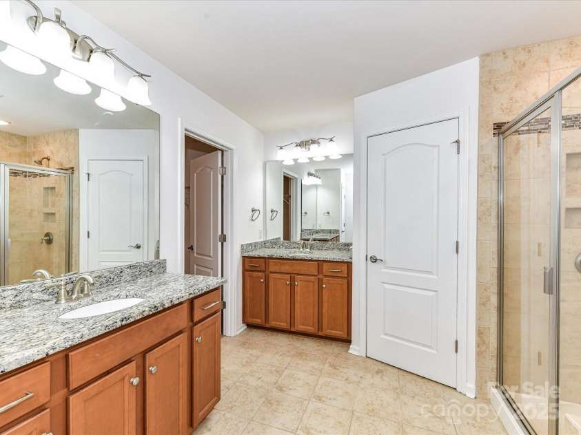 15747 Reynolds Drive, Indian Land, SC 29707.  MLS# CAR4246488, YatesRealty ID 21190. Primary Bathroom