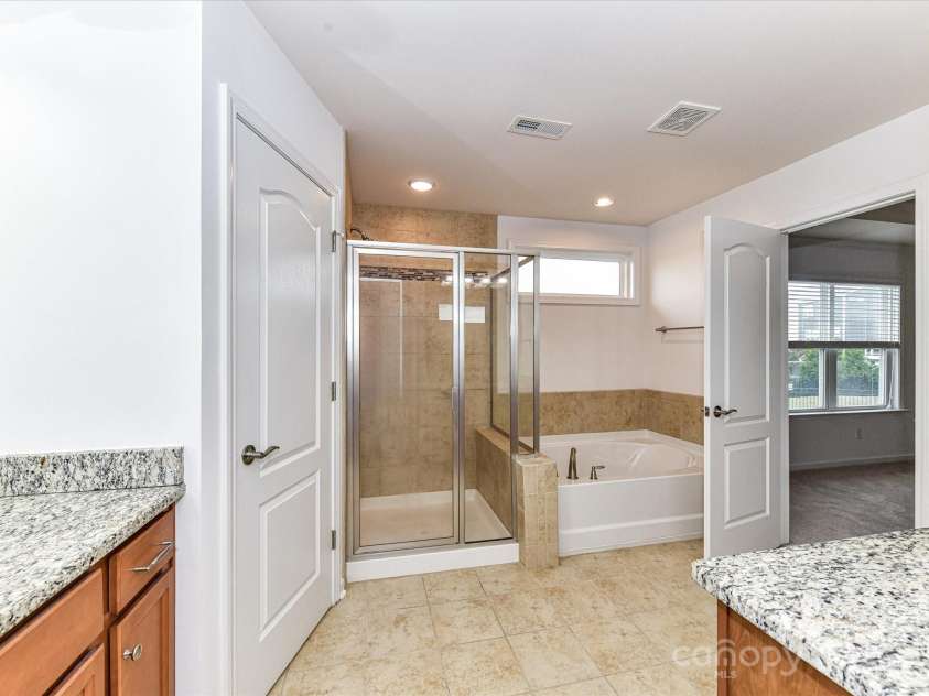 15747 Reynolds Drive, Indian Land, SC 29707.  MLS# CAR4246488, YatesRealty ID 21190. Primary Bathroom