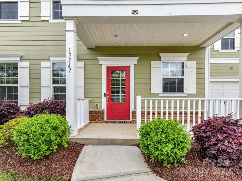15747 Reynolds Drive, Indian Land, SC 29707.  MLS# CAR4246488, YatesRealty ID 21190. Rocking Chair Front Porch