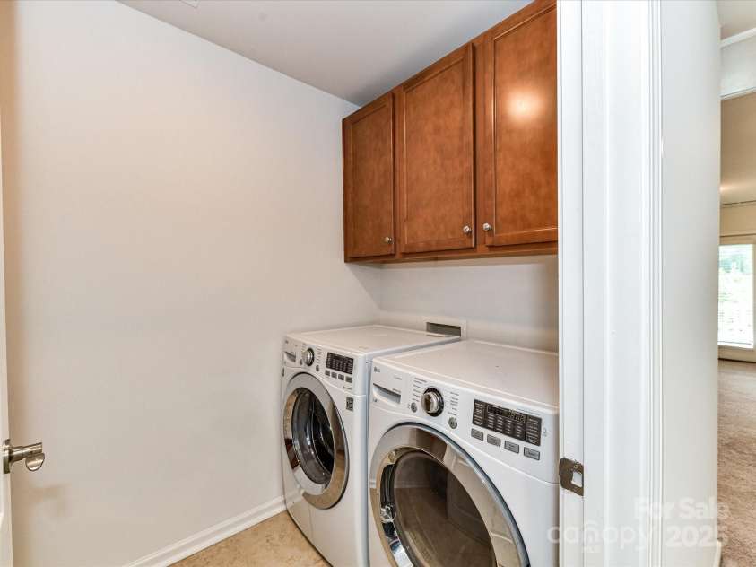 15747 Reynolds Drive, Indian Land, SC 29707.  MLS# CAR4246488, YatesRealty ID 21190. Upstairs Laundry Room