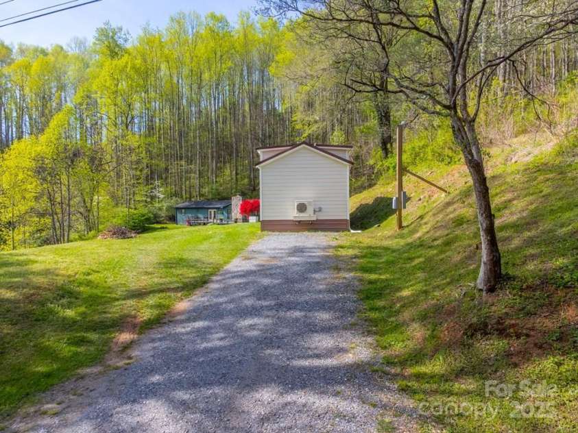 619/621 Kitchens Branch Road, Sylva, NC 28779.  MLS# CAR4247971, YatesRealty ID 21193. Tiny Home