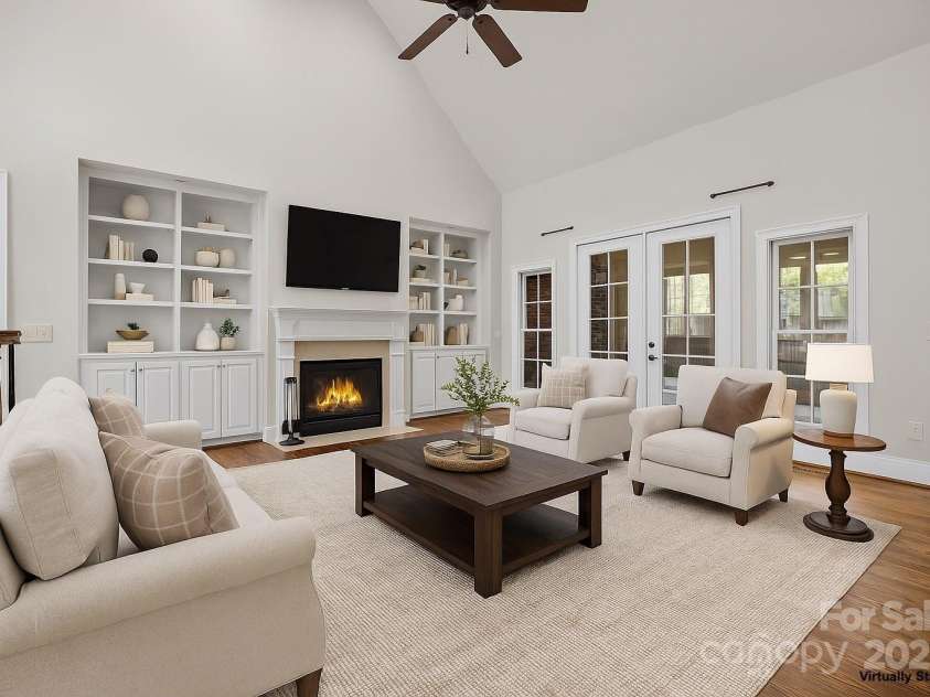 4113 Hoffmeister Drive, Waxhaw, NC 28173.  MLS# CAR4314044, YatesRealty ID 21196. Massive living room with fireplace and custom built-ins