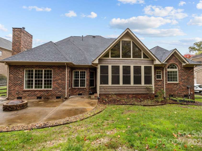 4113 Hoffmeister Drive, Waxhaw, NC 28173.  MLS# CAR4314044, YatesRealty ID 21196. Spacious, flat back yard with oversized concrete patio and fire pit