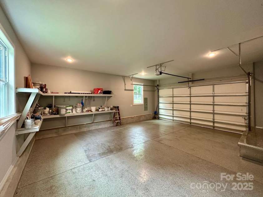 8701 Dixie Drive, Charlotte, NC 28278.  MLS# CAR4259510, YatesRealty ID 21197. Attached double garage - Finished