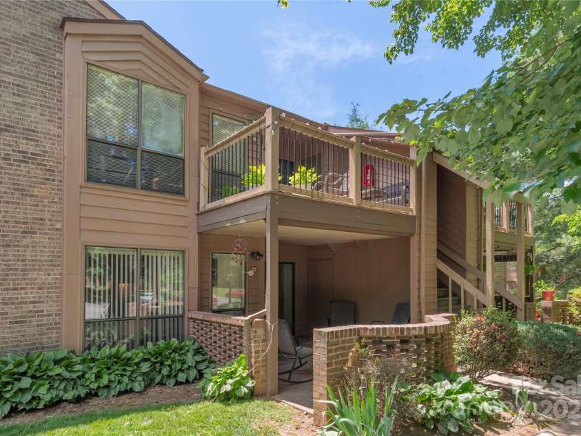 33 Ravencroft Lane, Asheville, NC 28803.  MLS# CAR4251539, YatesRealty ID 21199. Corner view - ground level