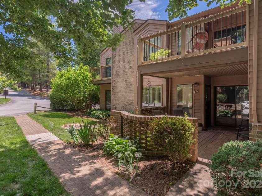 33 Ravencroft Lane, Asheville, NC 28803.  MLS# CAR4251539, YatesRealty ID 21199. Ground level view - patio