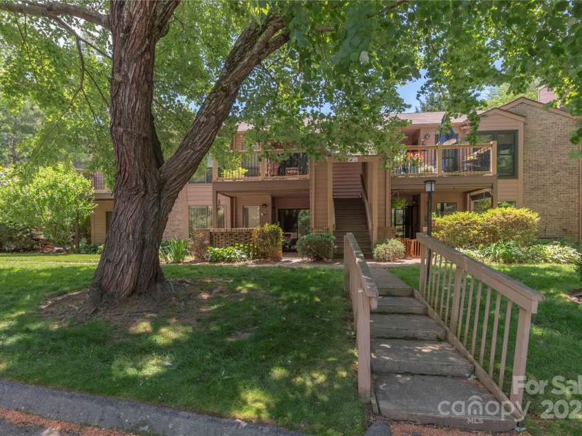 33 Ravencroft Lane, Asheville, NC 28803.  MLS# CAR4251539, YatesRealty ID 21199. View from parking area to front entrance