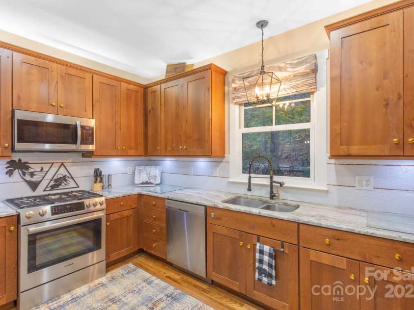 325 Hedgewood Drive, Tuckasegee, NC 28783.  MLS# CAR4316135, YatesRealty ID 2120. 