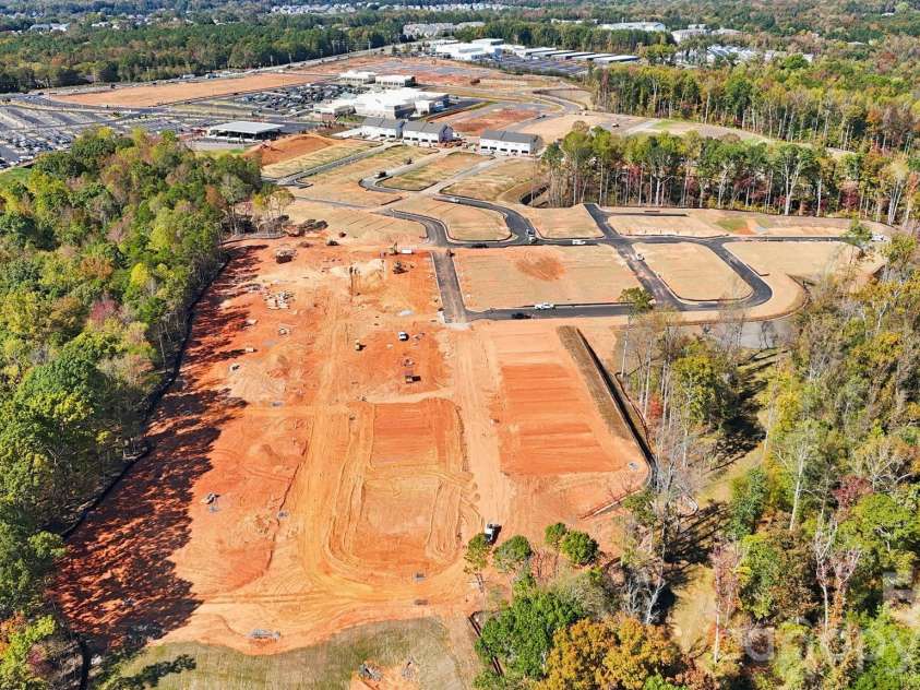 5557 Wolfpack Alley, Indian Land, SC 29707.  MLS# CAR4359866, YatesRealty ID 21203. Terraces at the Exchange Community