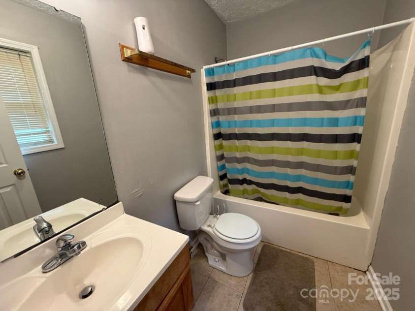 405 Jose Street, Shelby, NC 28150.  MLS# CAR4260554, YatesRealty ID 21207. Owner's Bathroom