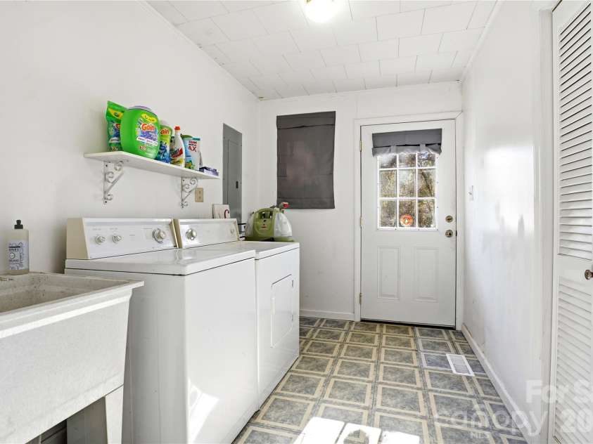 7775 Marlette Lane, Sherrills Ford, NC 28673.  MLS# CAR4341133, YatesRealty ID 2121. Dedicated laundry with utility sink for added functionality.