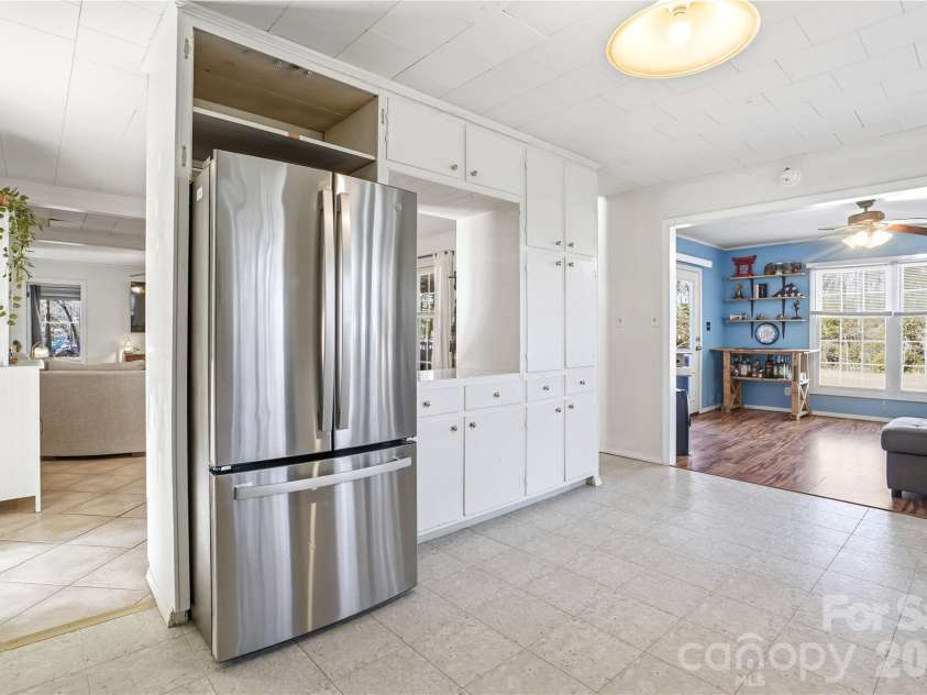 7775 Marlette Lane, Sherrills Ford, NC 28673.  MLS# CAR4341133, YatesRealty ID 2121. Kitchen-to-dining pass-through.