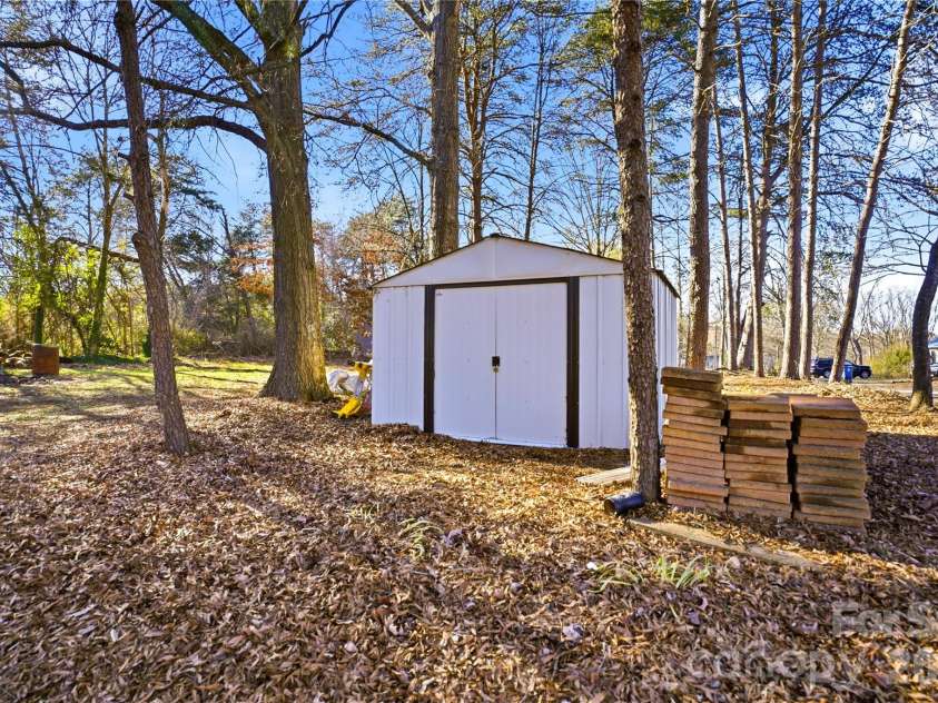 7775 Marlette Lane, Sherrills Ford, NC 28673.  MLS# CAR4341133, YatesRealty ID 2121. Shed provides space for tools, garden gear, or extras.
