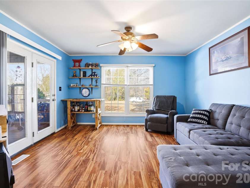 7775 Marlette Lane, Sherrills Ford, NC 28673.  MLS# CAR4341133, YatesRealty ID 2121. Versatile flex room with porch access