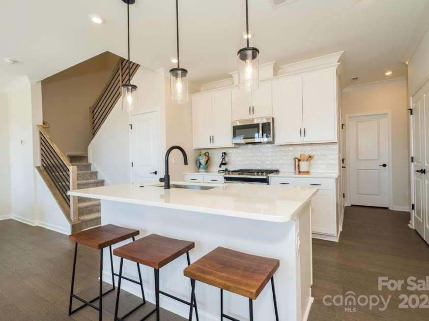 5919 Wetlands Alley, Charlotte, NC 28215.  MLS# CAR4145900, YatesRealty ID 21213. Trellis at Farmington | Plan 1 Model Home