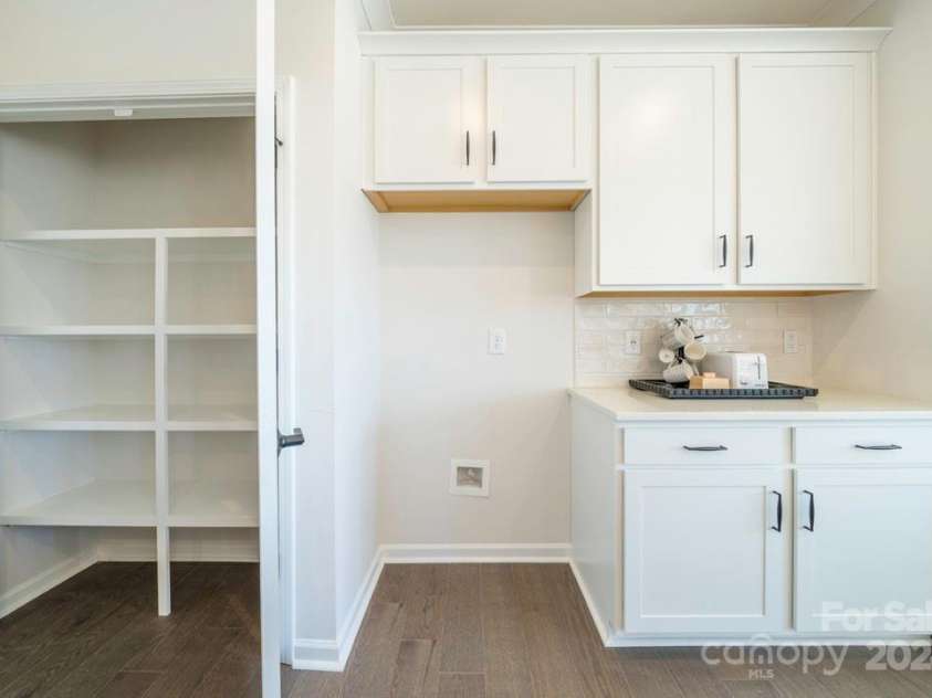 5919 Wetlands Alley, Charlotte, NC 28215.  MLS# CAR4145900, YatesRealty ID 21213. Trellis at Farmington | Plan 1 Model Home