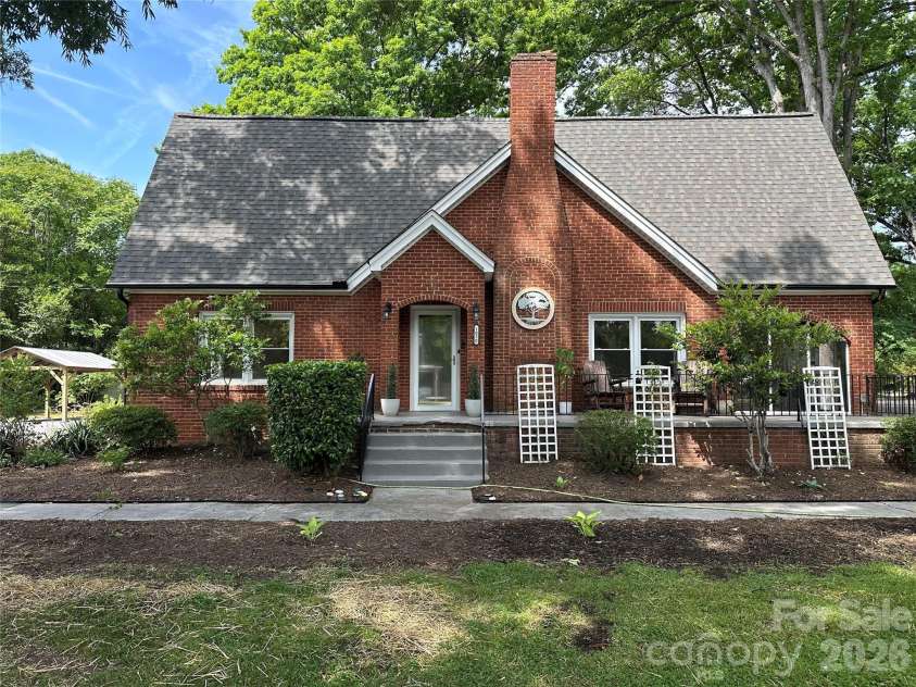 1050 Old Charlotte Road, Concord, NC 28027.  MLS# CAR4377115, YatesRealty ID 21214. Classic Tudor style