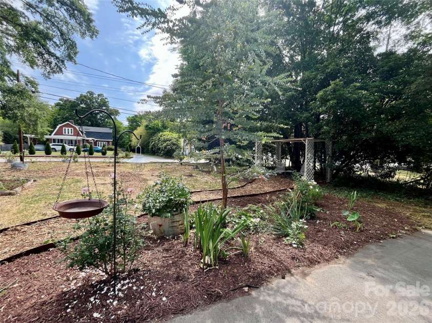1050 Old Charlotte Road, Concord, NC 28027.  MLS# CAR4377115, YatesRealty ID 21214. Garden area; ready for your your vision!