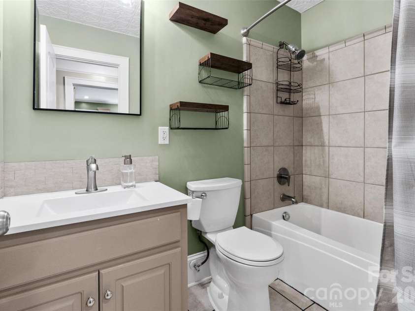 1050 Old Charlotte Road, Concord, NC 28027.  MLS# CAR4377115, YatesRealty ID 21214. Hall Bathroom