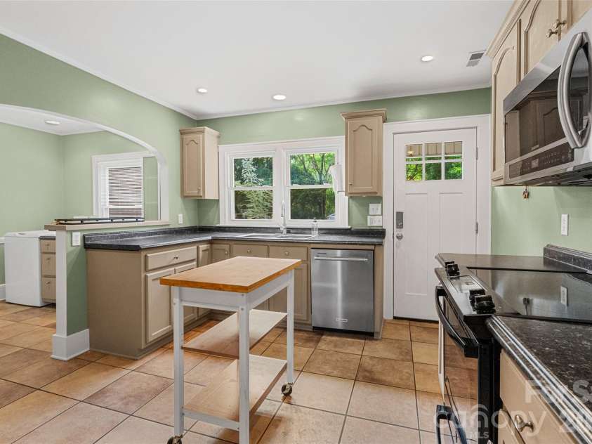1050 Old Charlotte Road, Concord, NC 28027.  MLS# CAR4377115, YatesRealty ID 21214. Large kitchen area for meal prep