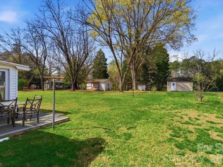 345 Magnolia Street, Mooresville, NC 28115.  MLS# CAR4361041, YatesRealty ID 21220. Expansive flat backyard