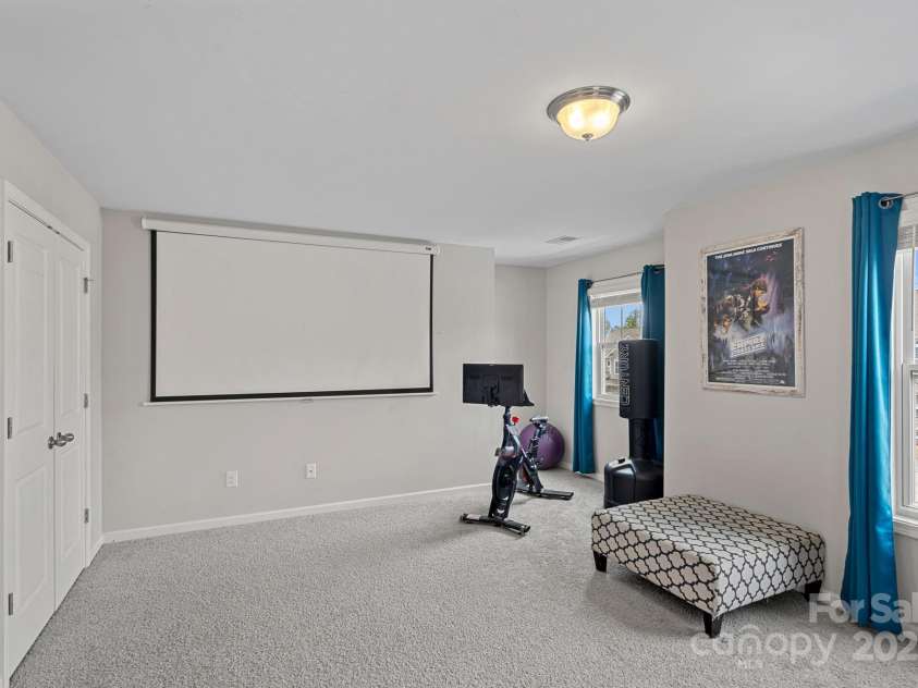 2032 Burton Point Court, Waxhaw, NC 28173.  MLS# CAR4250925, YatesRealty ID 21221. Bedroom/Theatre Room