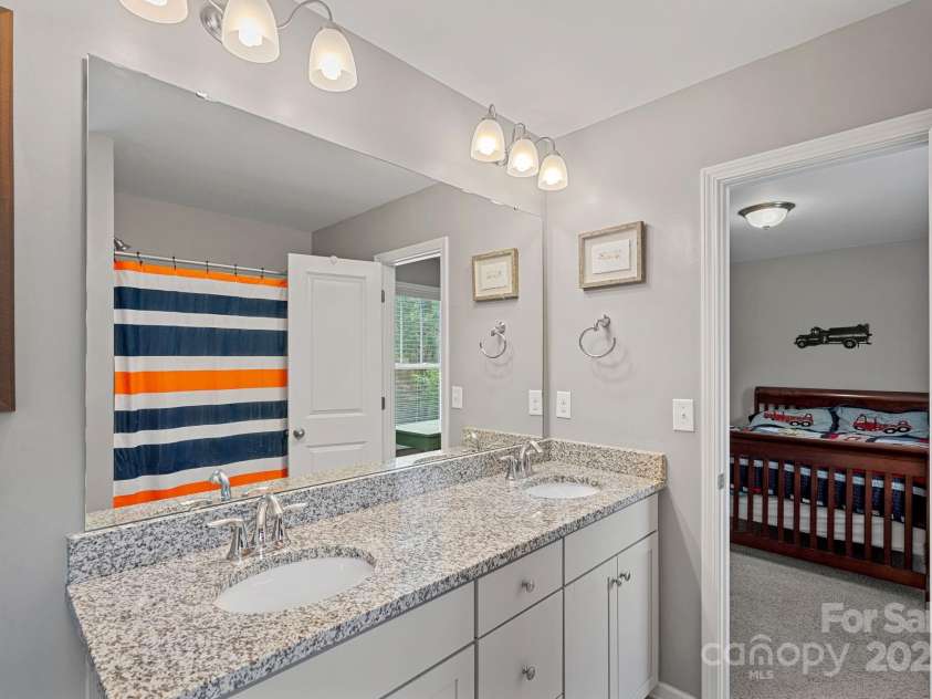 2032 Burton Point Court, Waxhaw, NC 28173.  MLS# CAR4250925, YatesRealty ID 21221. Jack and Jill Bathroom