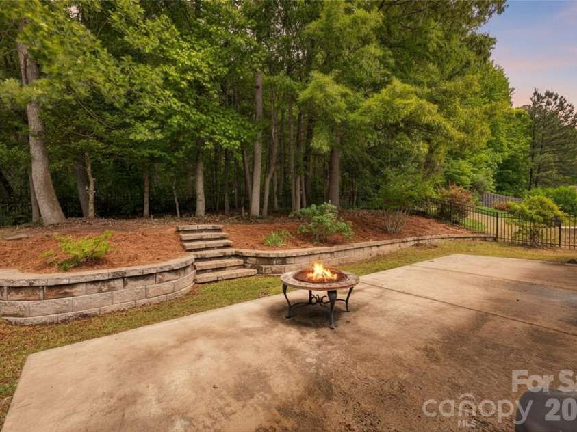 9095 Pembroke Court, Indian Land, SC 29707.  MLS# CAR4374675, YatesRealty ID 21221. Backyard view