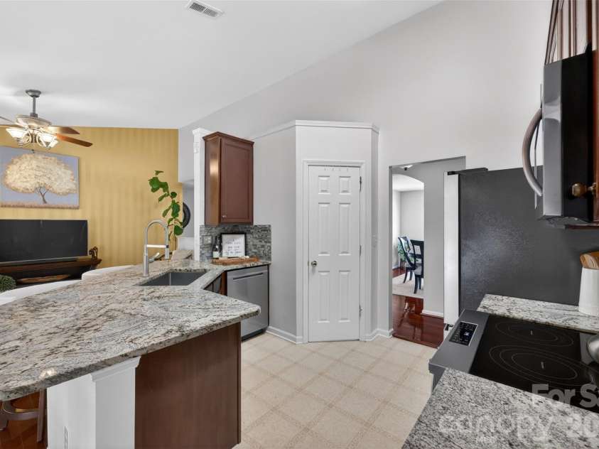 9095 Pembroke Court, Indian Land, SC 29707.  MLS# CAR4374675, YatesRealty ID 21221. Kitchen view and pantry