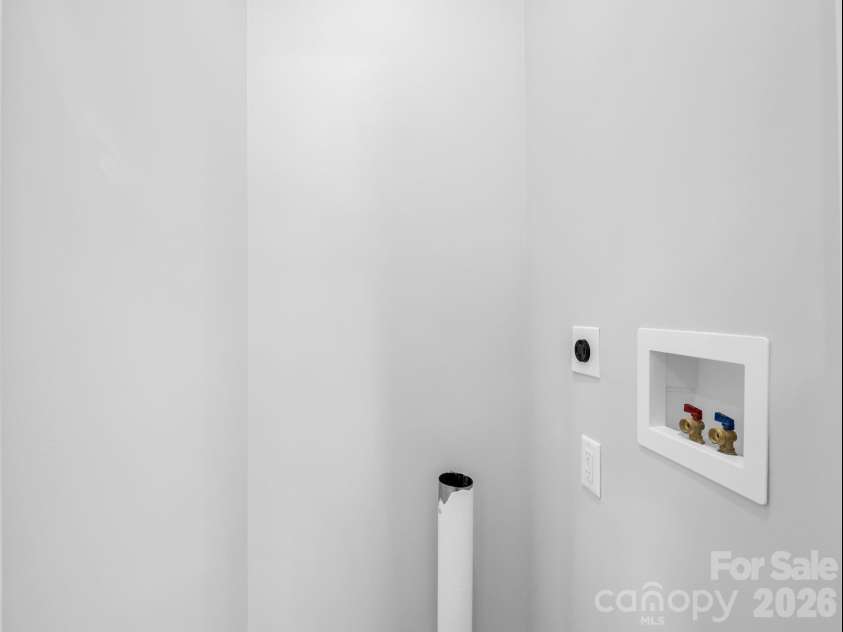 18 Worley Place, Asheville, NC 28806.  MLS# CAR4366279, YatesRealty ID 21222. Main level laundry closet