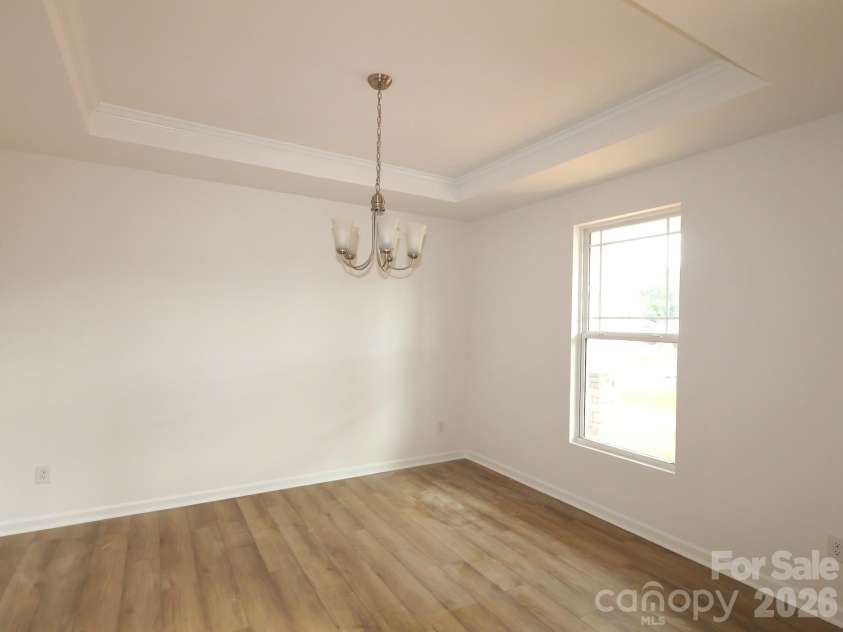 217 Amber Glen Drive, Locust, NC 28097.  MLS# CAR4373453, YatesRealty ID 21226. Dining room