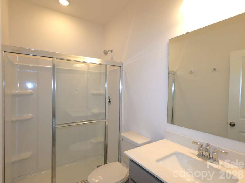 217 Amber Glen Drive, Locust, NC 28097.  MLS# CAR4373453, YatesRealty ID 21226. First floor bathroom