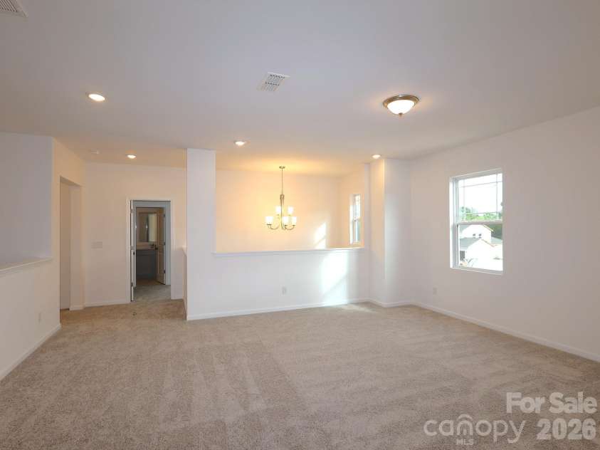 217 Amber Glen Drive, Locust, NC 28097.  MLS# CAR4373453, YatesRealty ID 21226. Loft
