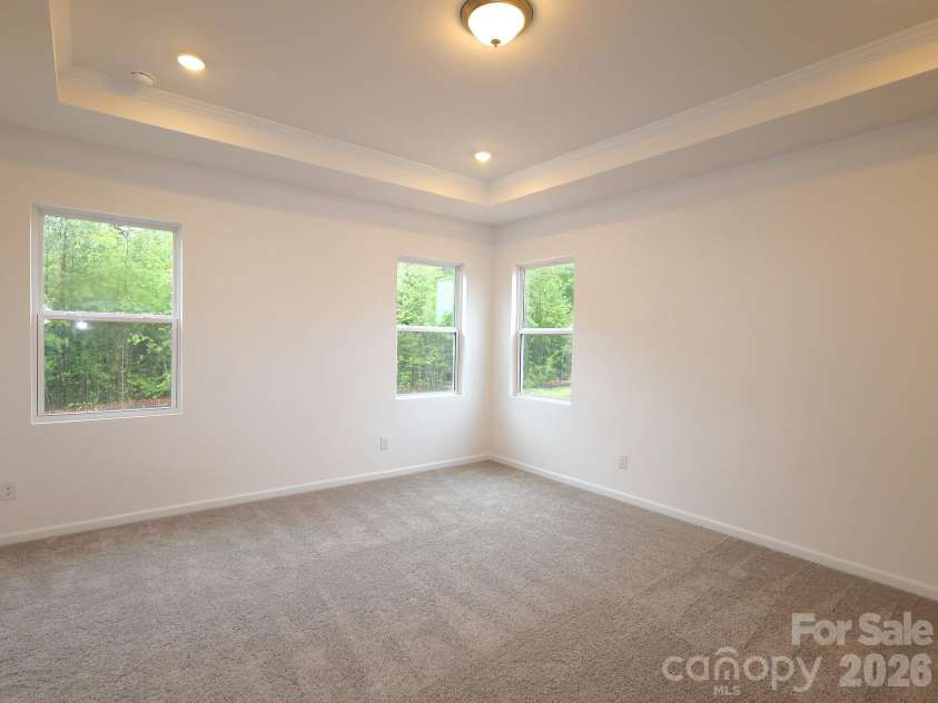 217 Amber Glen Drive, Locust, NC 28097.  MLS# CAR4373453, YatesRealty ID 21226. Owner's suite