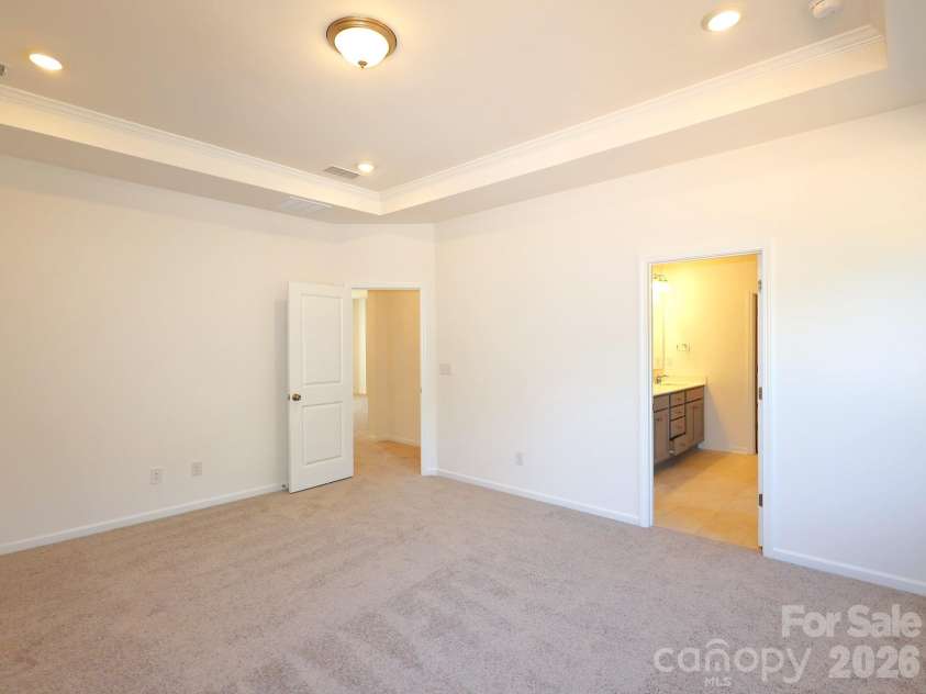 217 Amber Glen Drive, Locust, NC 28097.  MLS# CAR4373453, YatesRealty ID 21226. Owner's suite
