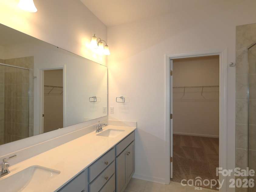 217 Amber Glen Drive, Locust, NC 28097.  MLS# CAR4373453, YatesRealty ID 21226. Owner's suite